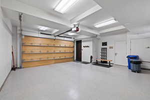 Garage featuring a garage door opener