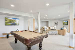 Rec room featuring light colored carpet, recessed lighting, and billiards table
