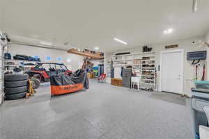 Garage featuring secured water heater