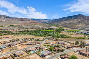 Aerial view of residential area with a mountainous background