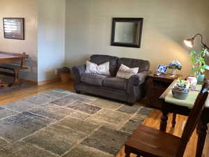 Living area featuring wood finished floors