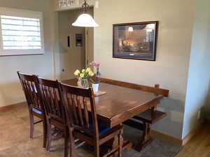 Dining space featuring baseboards