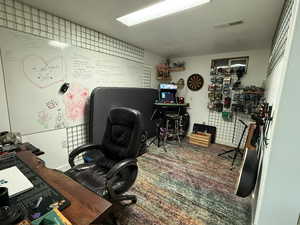 Office area with carpet flooring