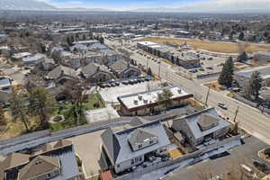 Aerial view of residential area featuring mountains