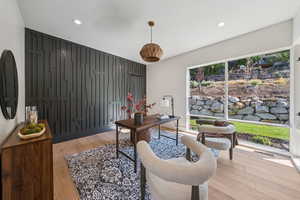 Home office featuring light wood finished floors and recessed lighting