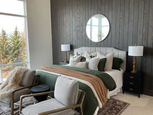 Bedroom with wooden walls