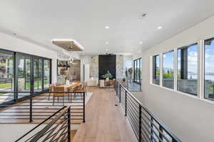 Kitchen featuring light wood-style floors, recessed lighting, and a mountain view