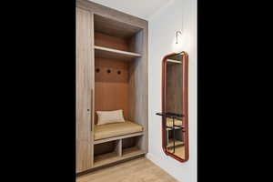 Mudroom featuring wood finished floors