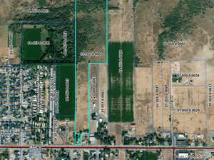 Aerial overview of property's location with property parcel outlined