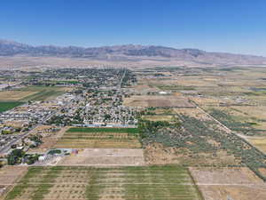 Aerial overview of property's location featuring rural landscape and mountains