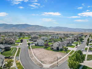 Aerial perspective of suburban area with mountains