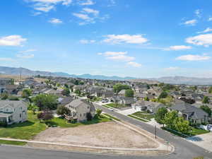 Aerial view of residential area with a mountain backdrop