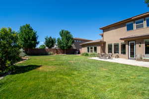 View of yard with a patio area