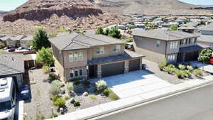View of mountain background featuring nearby suburban area