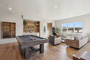 Rec room featuring billiards table, light wood-style flooring, and recessed lighting