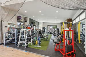 Workout area featuring healthy amount of natural light and recessed lighting