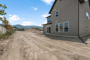 Rear view of house with a mountain view