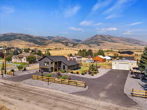 View of mountain backdrop with nearby suburban area