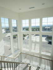 Unfurnished sunroom featuring healthy amount of natural light