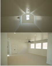 Empty room featuring carpet flooring, a ceiling fan, and lofted ceiling
