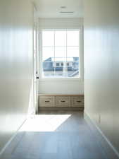 Mudroom featuring baseboards