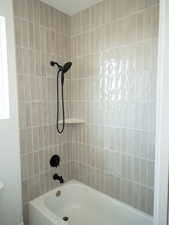 Bathroom featuring shower / tub combination