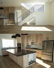 Kitchen with decorative backsplash, wood finished floors, light brown cabinets, and stainless steel appliances