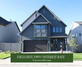 View of front of house featuring a garage, board and batten siding, and concrete driveway