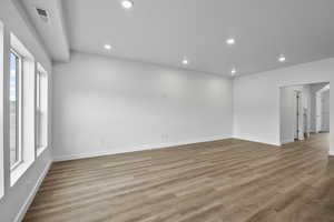 Spare room featuring recessed lighting and light wood-style floors