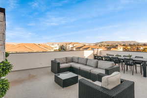 View of patio featuring a residential view, outdoor dining space, and outdoor lounge area