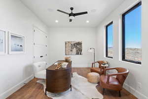 Office with wood finished floors, recessed lighting, and ceiling fan