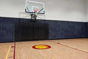 View of sport court with basketball hoop