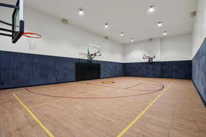 View of basketball court featuring basketball hoop