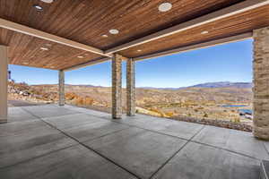 View of patio / terrace with a mountain view