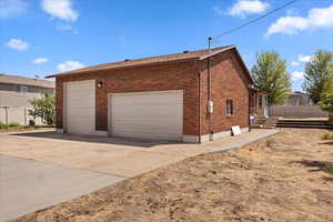 View of home's exterior featuring brick siding