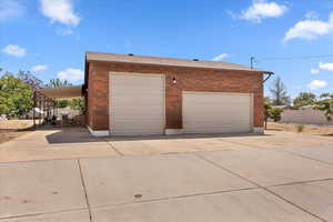 Garage with concrete driveway