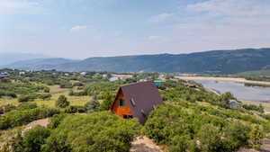 Mountain view featuring a large body of water
