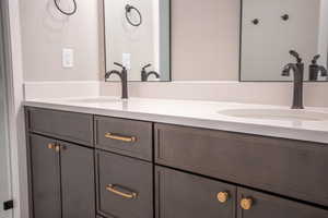Bathroom featuring double vanity