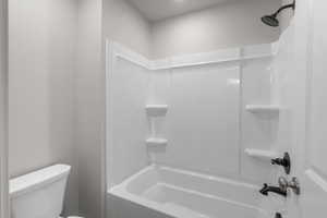Bathroom featuring  shower combination