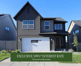 View of front facade with an attached garage and concrete driveway