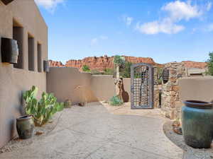 View of patio / terrace featuring a gate