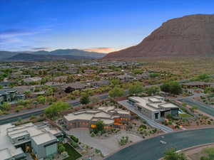 Aerial view of residential area featuring mountains