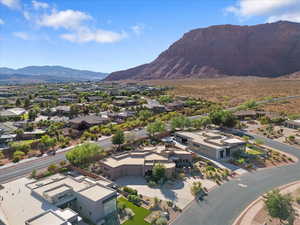 Aerial view of residential area with a mountainous background