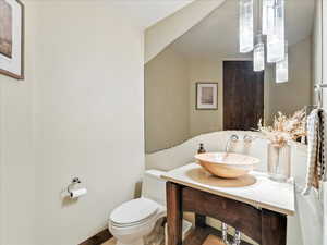 Bathroom featuring toilet and vanity