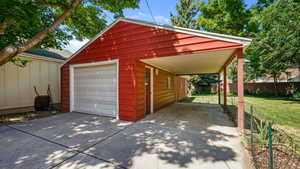 Single car with shop or two car tandem garage, plus car port