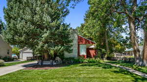 Concrete side walk to front door and concrete driveway