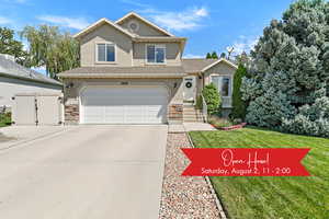 Lovely exterior with oversized driveway for additional parking