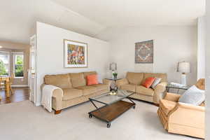 Living room with vaulted ceilings