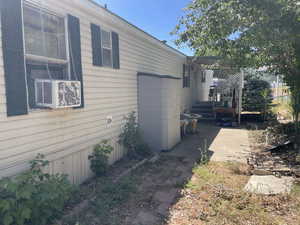 View of home's exterior with a patio area