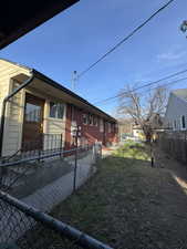 View of side of home featuring brick siding